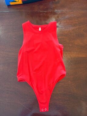 Sleeveless Red Women’s Bodysuit with Snap Closure